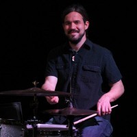 ADAM BRYAN CLARK